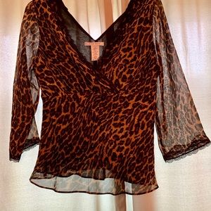 Like new animal print top, sheer with liner